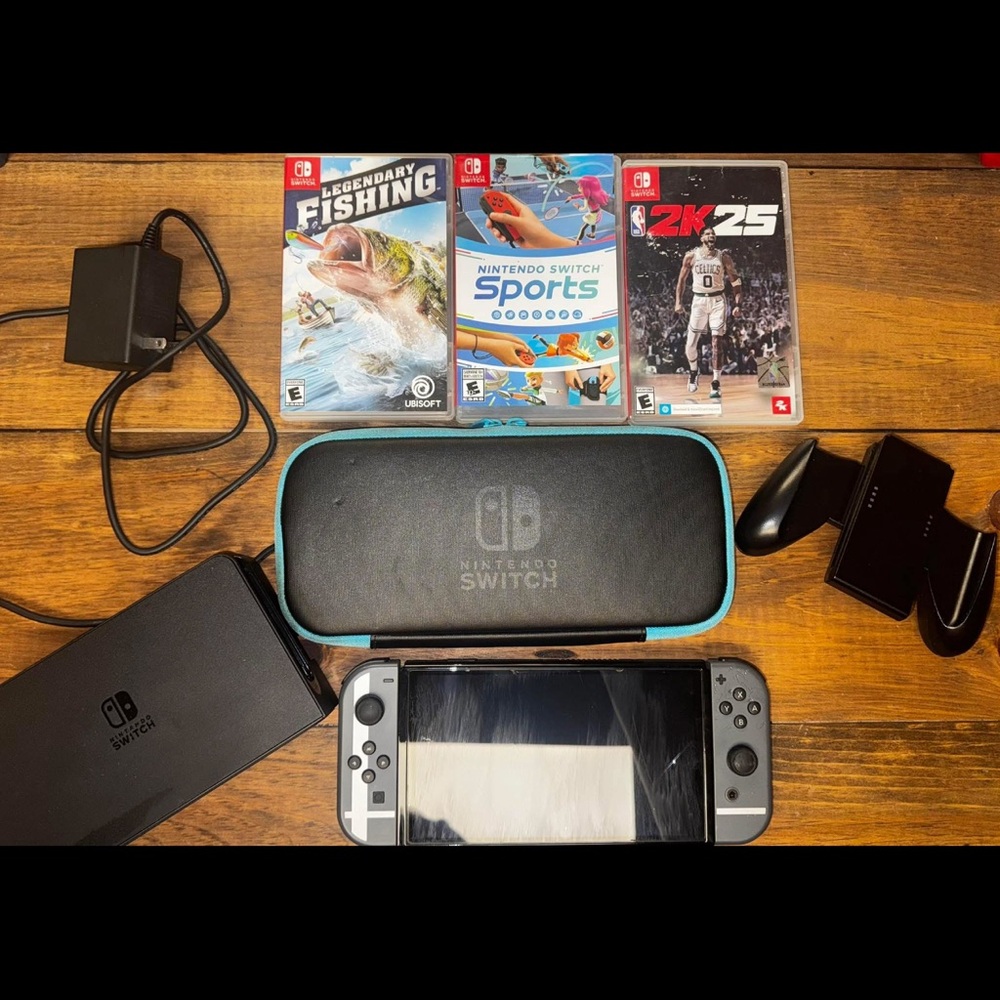 Nintendo Switch with Travel Case, 3 games & accessories.